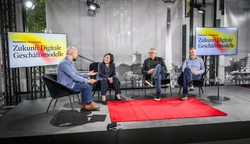 Photo of panel discussion on the future of digital business models.